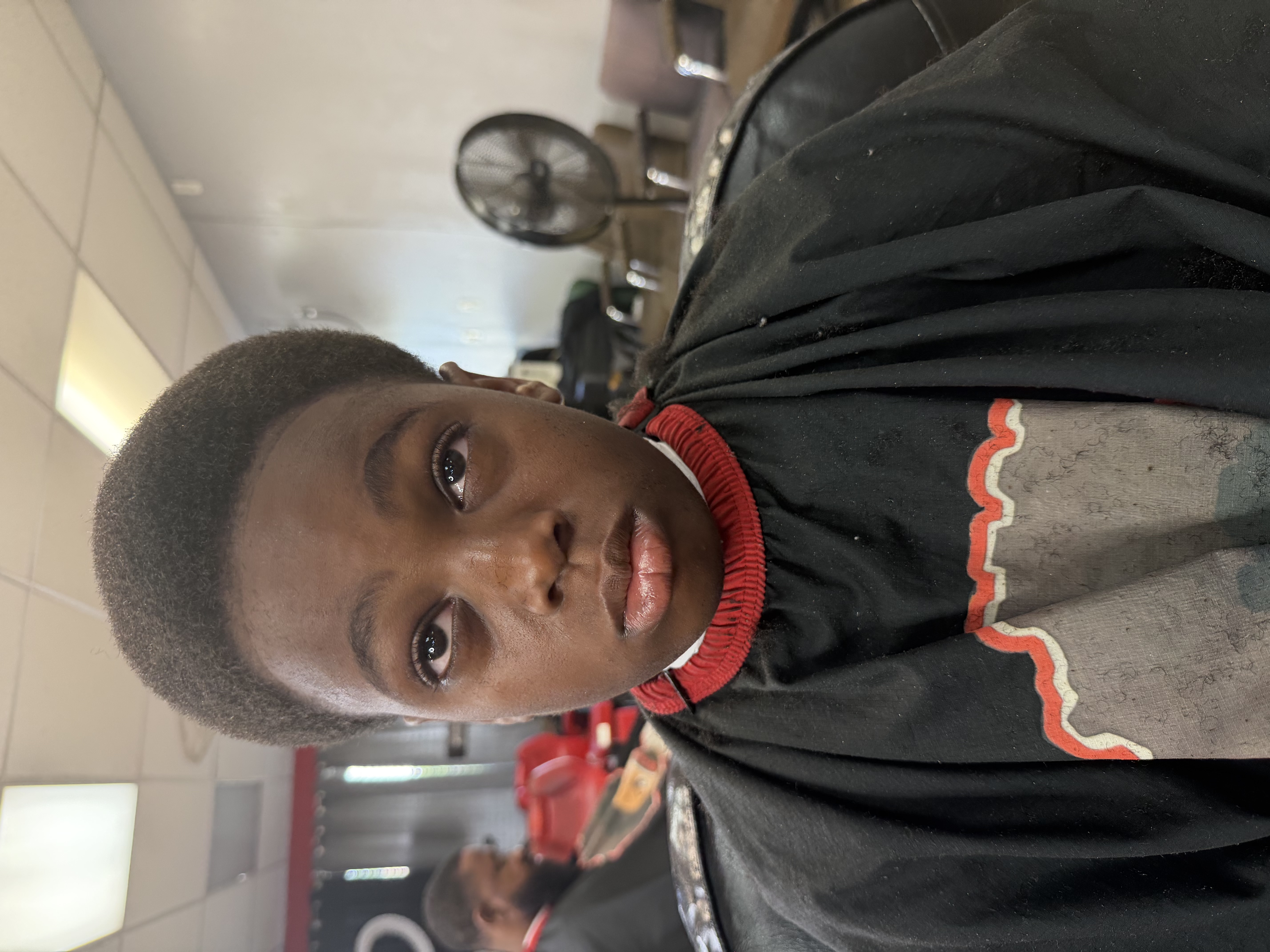 Young client after a shape up with a crisp lineup