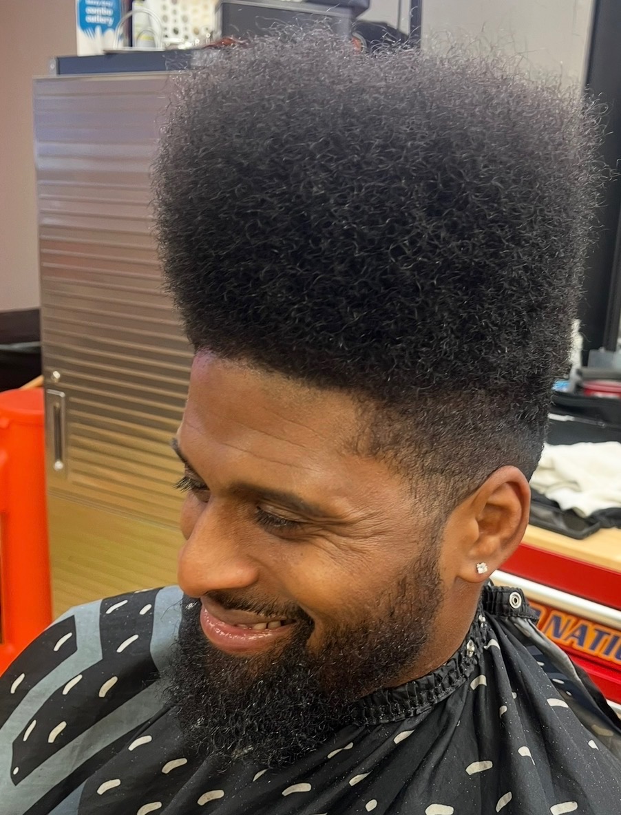The same client before, with a rounded, grown-out high top