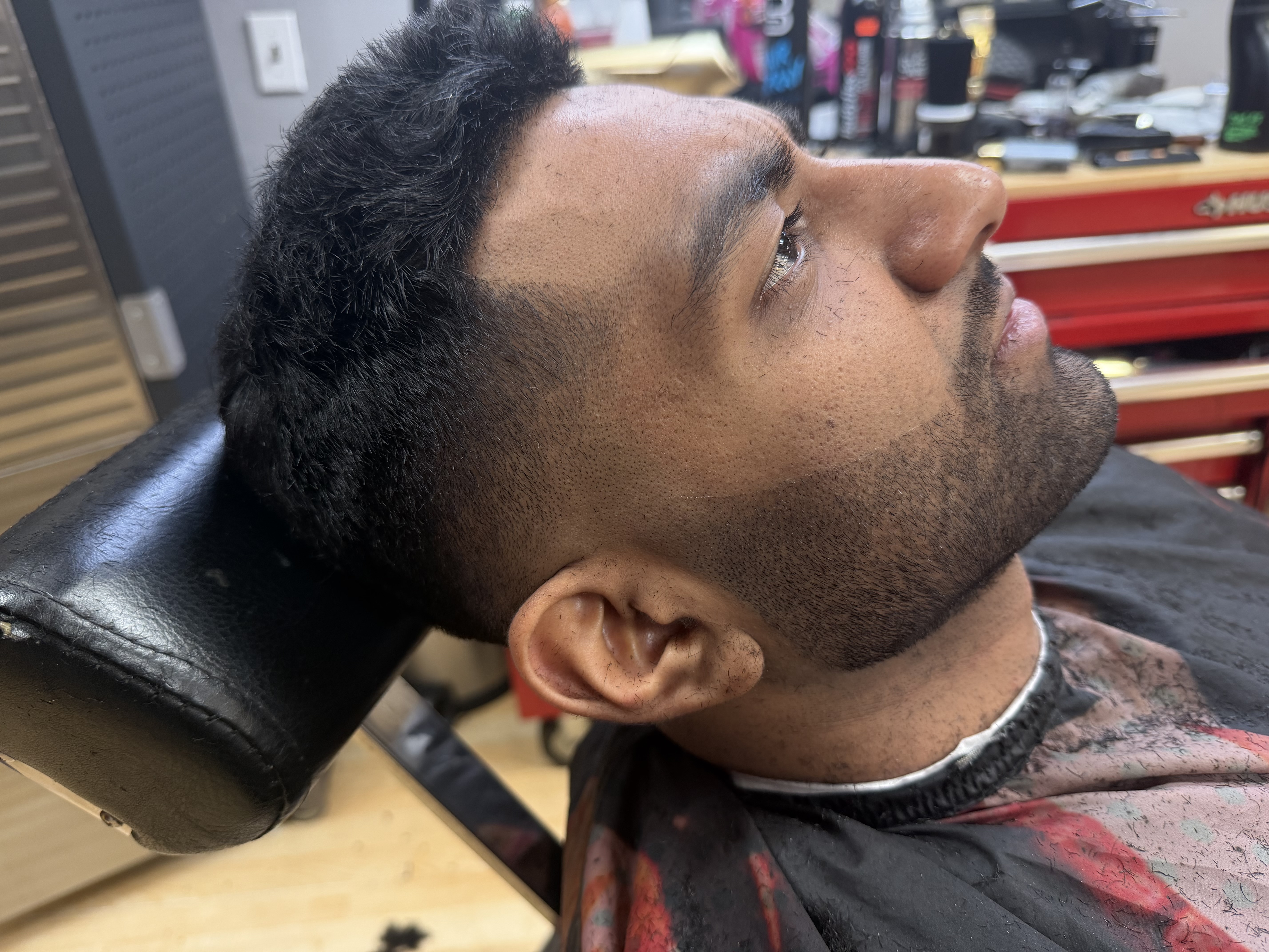 The same client before, with a grown-out top and untrimmed beard